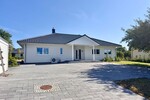 Jetzt Miete möglich! Winkelbungalow 5 km bis Neubrandenburg, Baujahr 2022, Doppelgarage, EBK,Carport - Einfamilienhaus Sponholz | Angebot:25929684