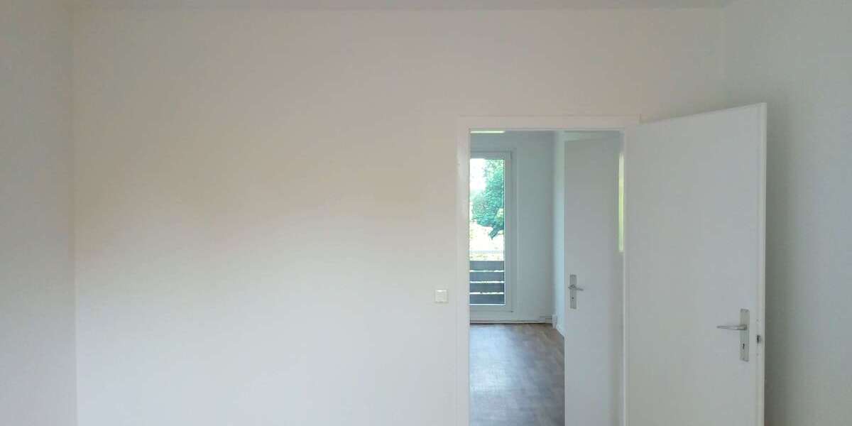 Blick vom Schlafzimmer zum Woh